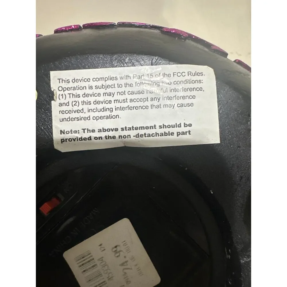 Halloween witch leg cauldron w/black pot labeled 